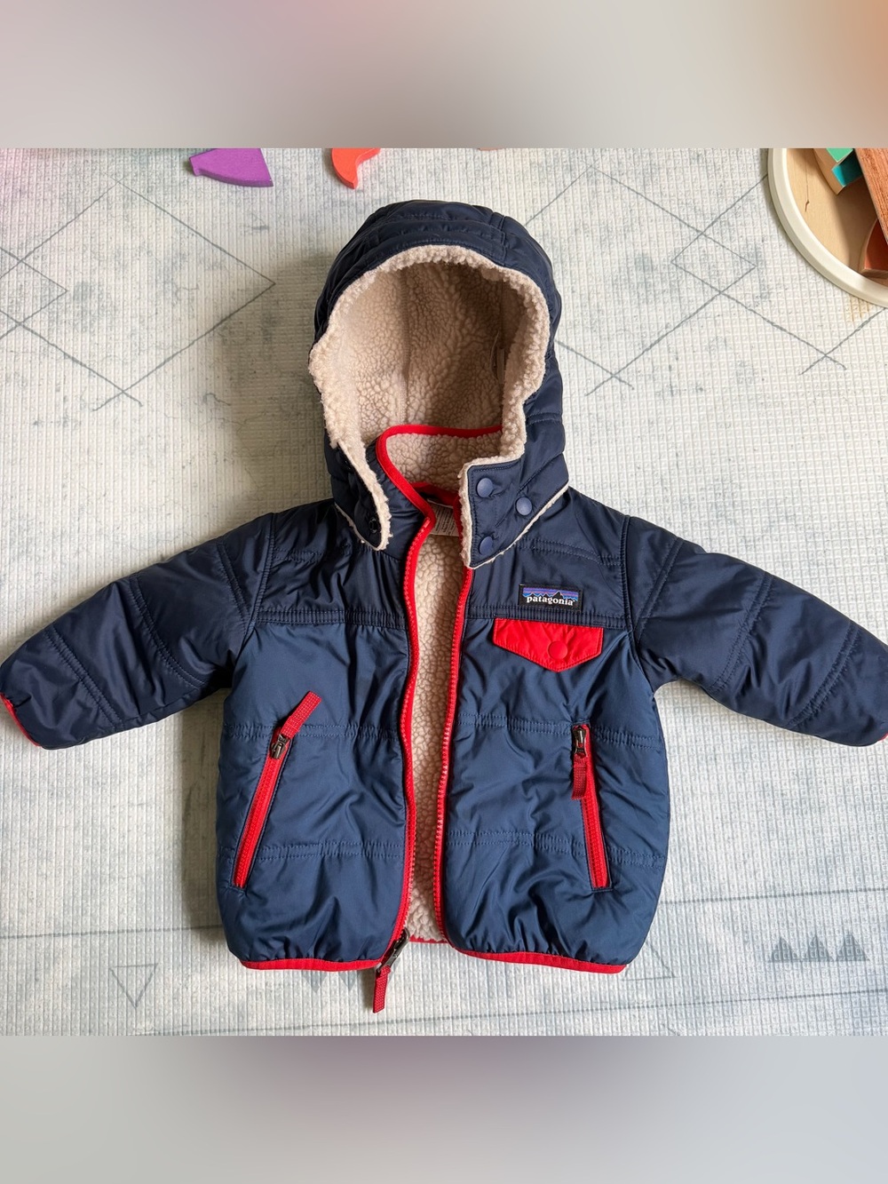 Patagonia Kids Navy Jacket with Red Trim and Cream Sherpa Lining